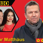 Ein aktuelles Porträt von Lothar Matthäus im Jahr 2026, das den TV-Experten und ehemaligen Fußball-Weltmeister lächelnd zeigt.